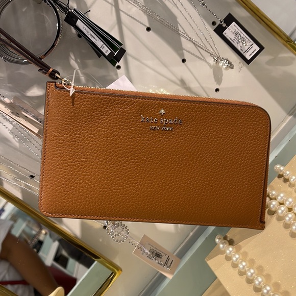 Kate Spade Medium Lucy L-Zip Wristlet Pebble Leather 

Warm Gingerbread 
NWT - Picture 12 of 16